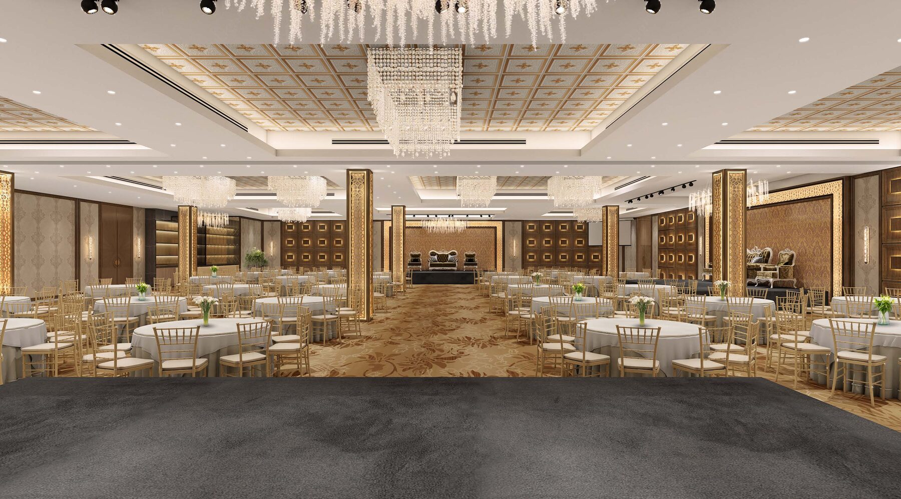 Crystal chandeliers suspended above the bright ballroom